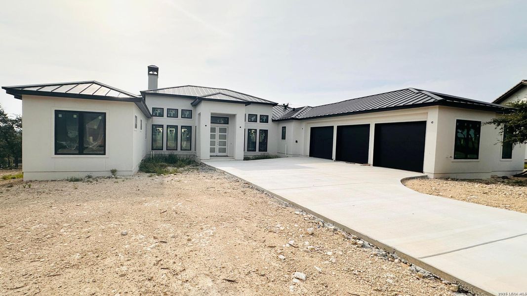 Front exterior of a new home in , San Antonio, TX, highlighting curb appeal (Image 7).