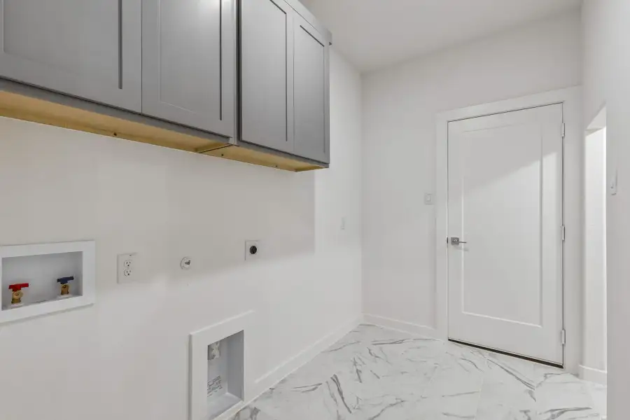 Utility Room in the Claret home plan by Trophy Signature Homes – REPRESENTATIVE PHOTO