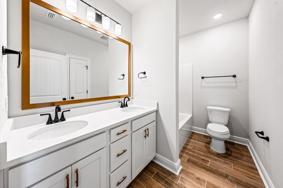 Furnished interior view inside a new home in Natureview, Freeport (Image 7).