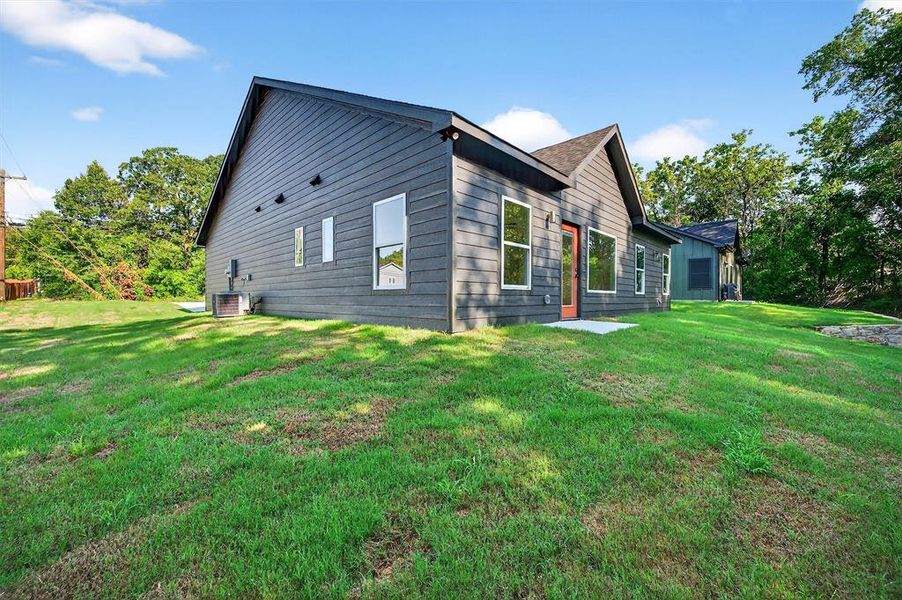 Front exterior of a new home in , Denison, TX, highlighting curb appeal (Image 1). Front exterior of a new home in , Denison, TX, highlighting curb appeal (Image 1).