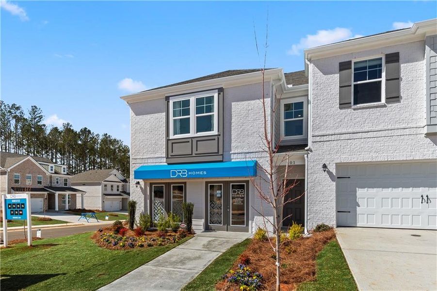 Front exterior of a new home in Bowers Farm, McDonough, GA, highlighting curb appeal (Image 2). Front exterior of a new home in Bowers Farm, McDonough, GA, highlighting curb appeal (Image 2).