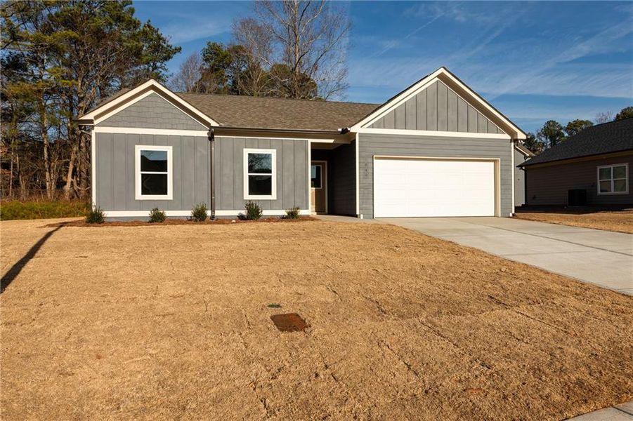 Front exterior of a new home in , Lawrenceville, GA, highlighting curb appeal (Image 19).