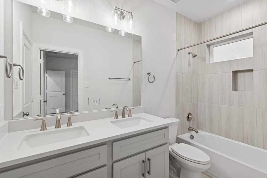 Furnished interior view inside a new home in Grange 45' Homesites, Katy (Image 8).