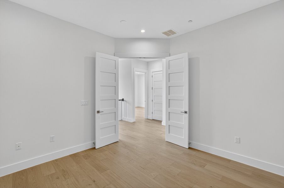 Spacious, unfurnished interior of a new home in Milky Way at River Place, Austin (Image 29).