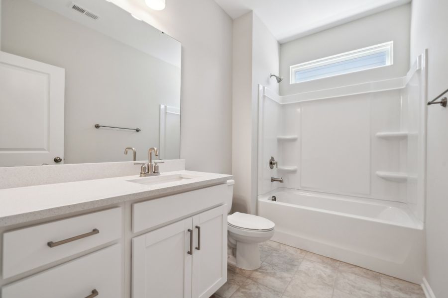 Representative furnished interior of a home built from the Cotswold Signature by Taylor Morrison in The Coves on Lake Wylie, Charlotte (Image 9).