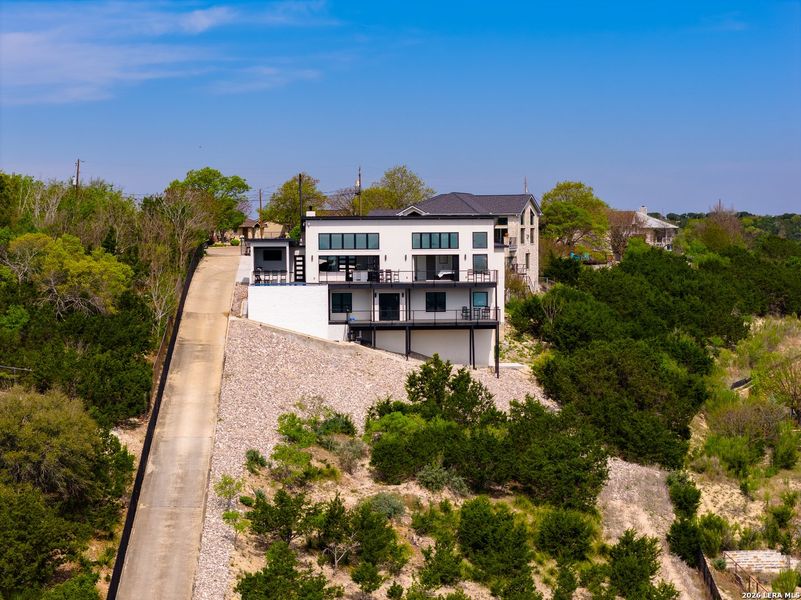 Front exterior of a new home in , Kerrville, TX, highlighting curb appeal (Image 26).
