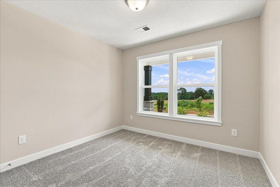 Spacious, unfurnished interior of a new home in Davis Heights, Inman (Image 28).
