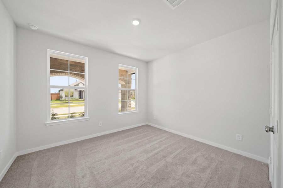 Spacious, unfurnished interior of a new home in Sunterra, Katy (Image 18).