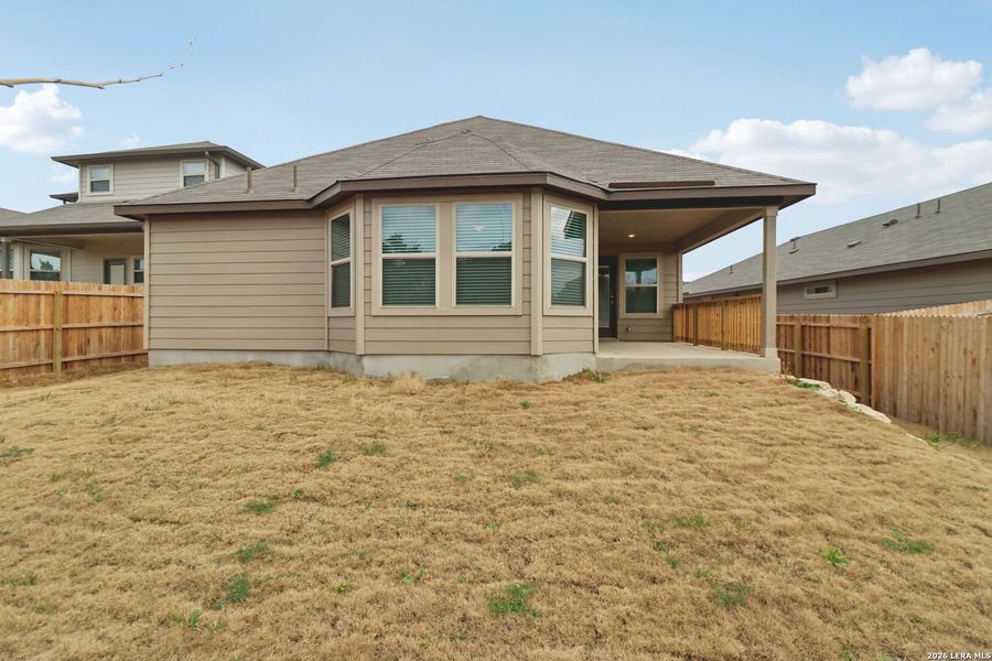 Exterior details and patio area of a home in Scenic Crest - Premier Series, Boerne (Image 4).