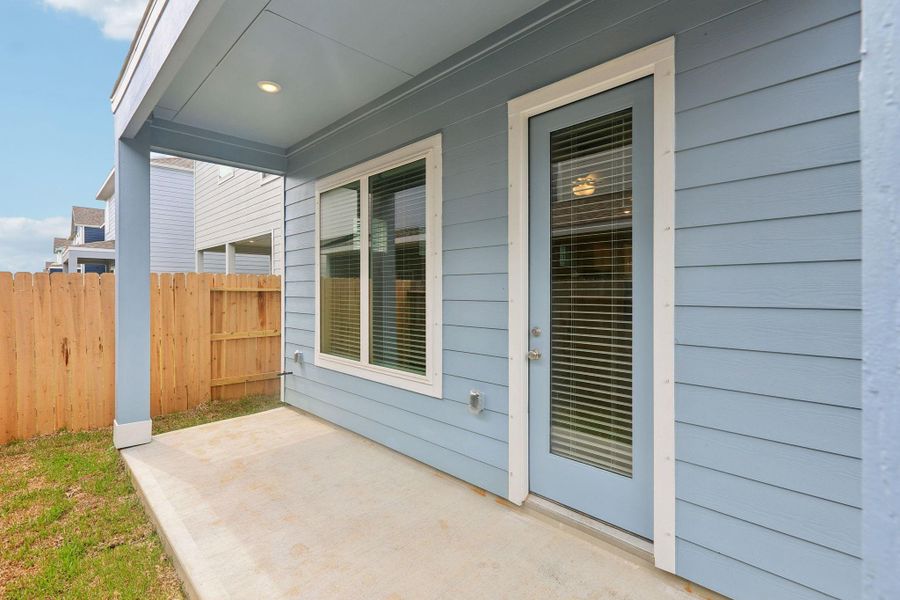 Front exterior of a new home in Kemah Crossing - Luxe Series, Kemah, TX, highlighting curb appeal (Image 2). Front exterior of a new home in Kemah Crossing - Luxe Series, Kemah, TX, highlighting curb appeal (Image 2).