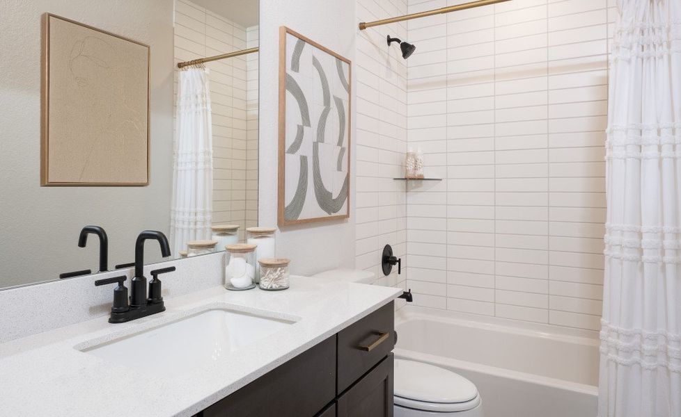 Representative furnished interior of a home built from the Colton by Ashton Woods in Covered Bridge, Hutto (Image 12).