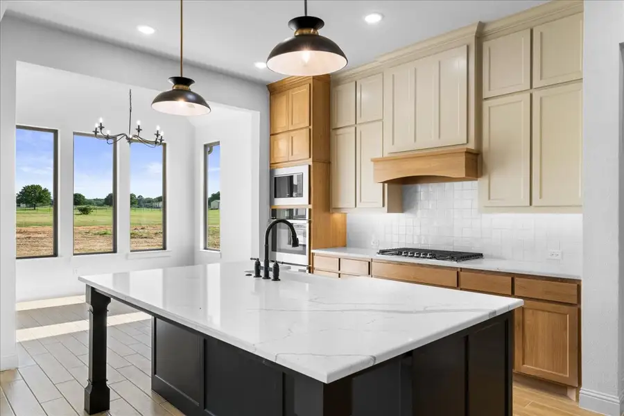 Representative furnished interior of a home built from the The Aylin by Doug Parr Custom Homes in Kessler Farms, Brock (Image 17).