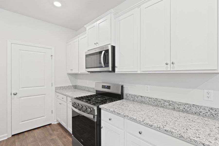 Furnished interior view inside a new home in Pine Hills at Cane Bay, Summerville (Image 6).