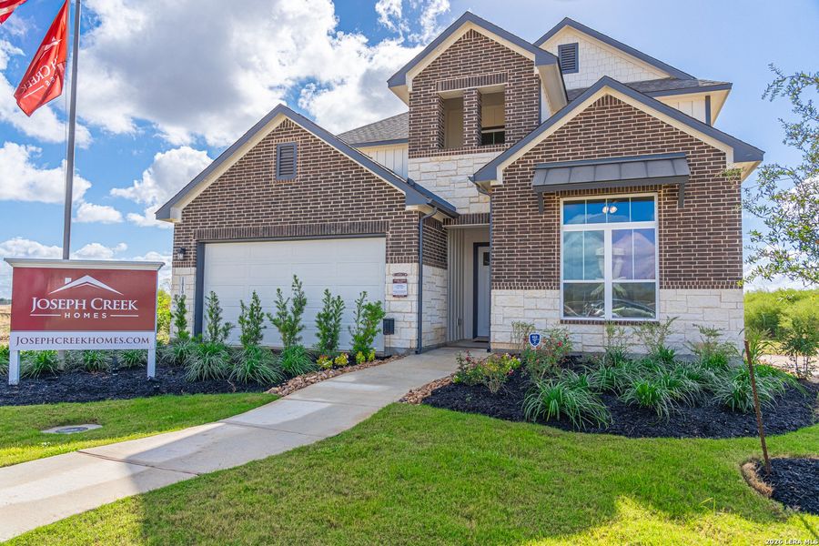 Front exterior of a new home in , Schertz, TX, highlighting curb appeal (Image 22). Front exterior of a new home in , Schertz, TX, highlighting curb appeal (Image 22).