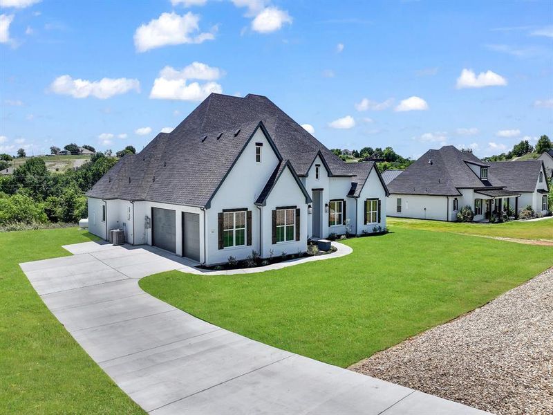 Front exterior of a new home in , Fort Worth, TX, highlighting curb appeal (Image 1). Front exterior of a new home in , Fort Worth, TX, highlighting curb appeal (Image 1).