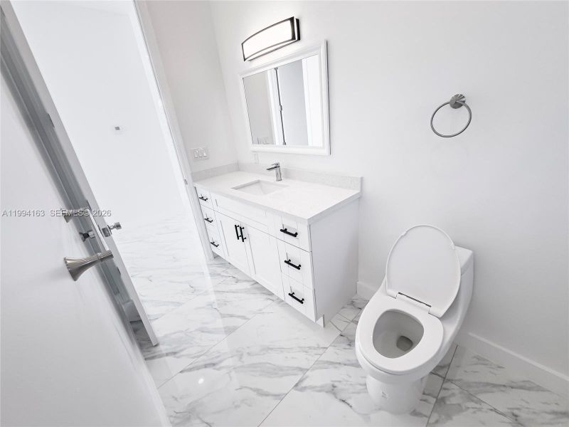 Furnished interior view inside a new home in , Port St. Lucie (Image 16).