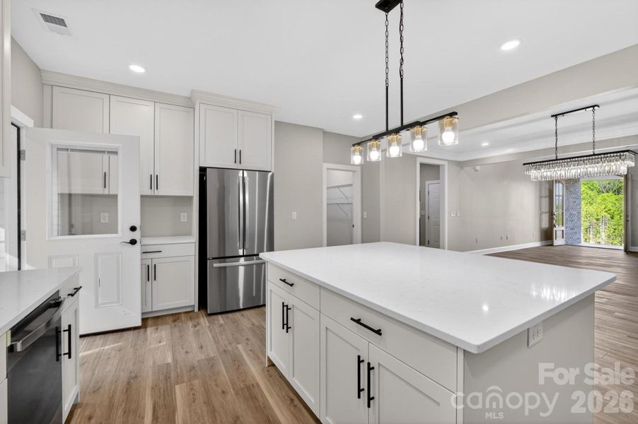 Furnished interior view inside a new home in , Lenoir (Image 10).