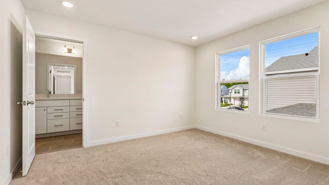 Furnished interior view inside a new home in Cyrene at Harmony, St. Cloud (Image 22).