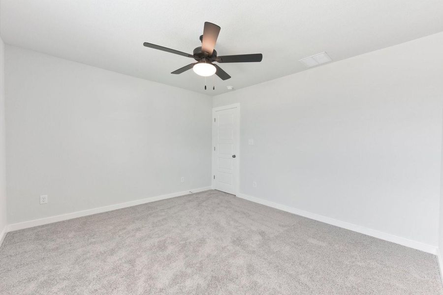 Spacious, unfurnished interior of a new home in Stallion Run, Buda (Image 34).