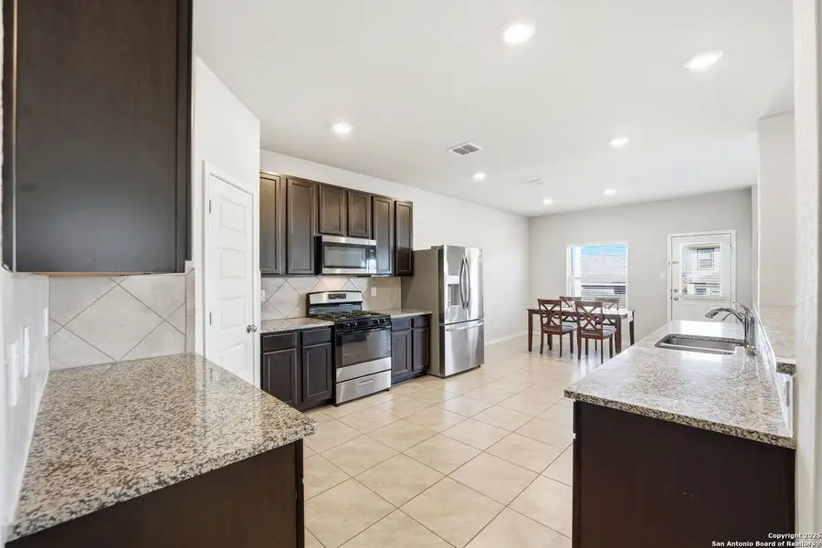 Furnished interior view inside a new home in Abbott Place, St. Hedwig (Image 10).