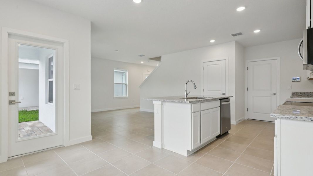 Kitchen of the Coronado - End at Cyrene at Harmony located in St Cloud FL by DRB Homes