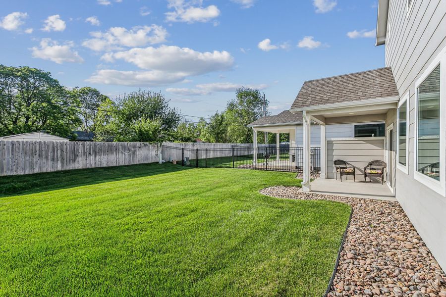 Exterior details and patio area of a home in Heritage Commons, Andover (Image 21).