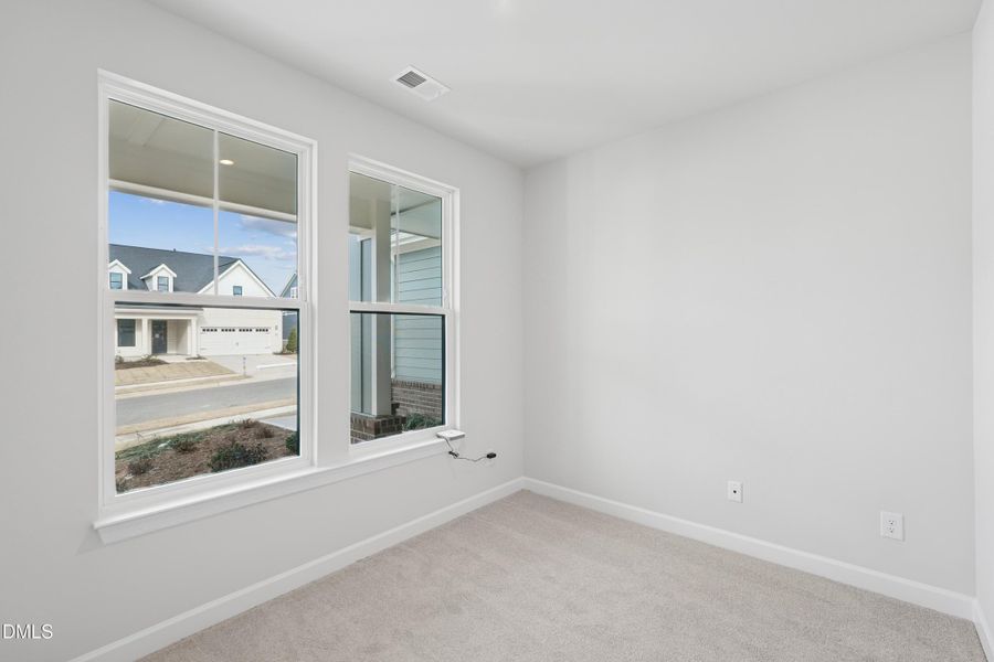 Guest bedroom at front of home Guest bedroom at front of home
