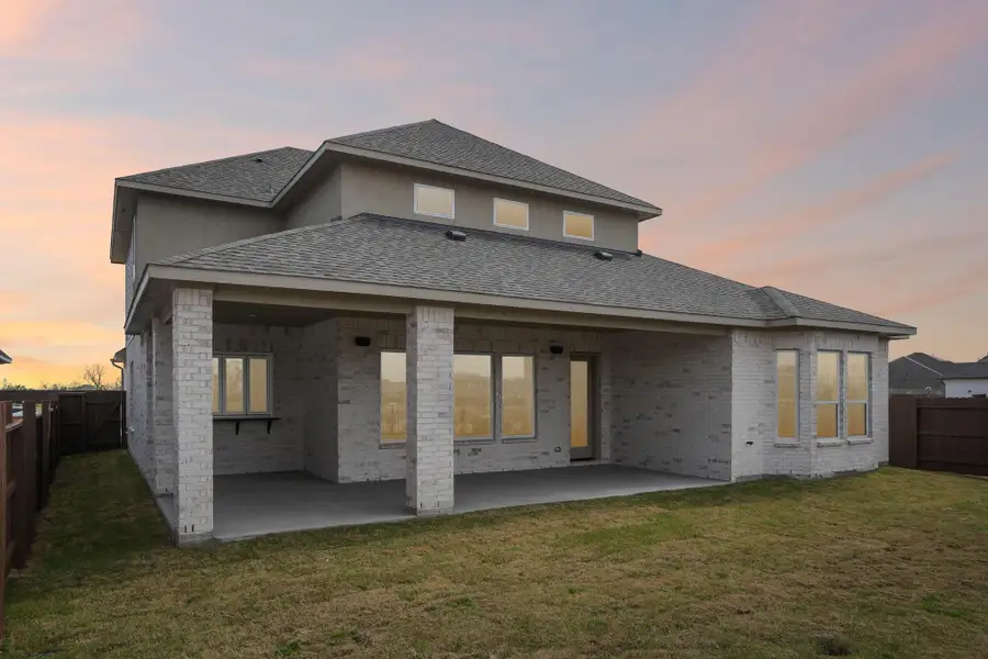 Exterior details and patio area of a home in Del Bello Lakes 60', Manvel (Image 29).