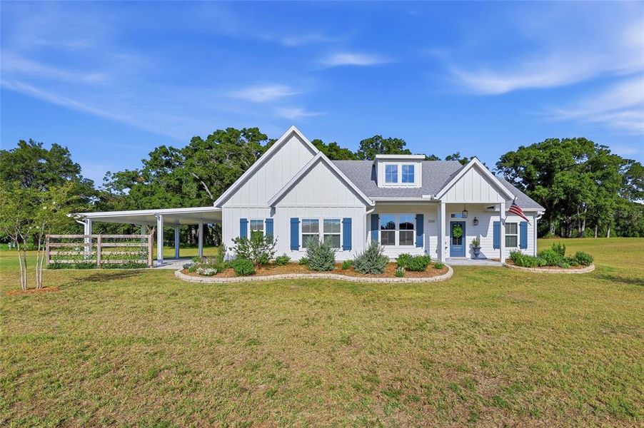 Front exterior of a new home in , Bell, FL, highlighting curb appeal (Image 23). Front exterior of a new home in , Bell, FL, highlighting curb appeal (Image 23).