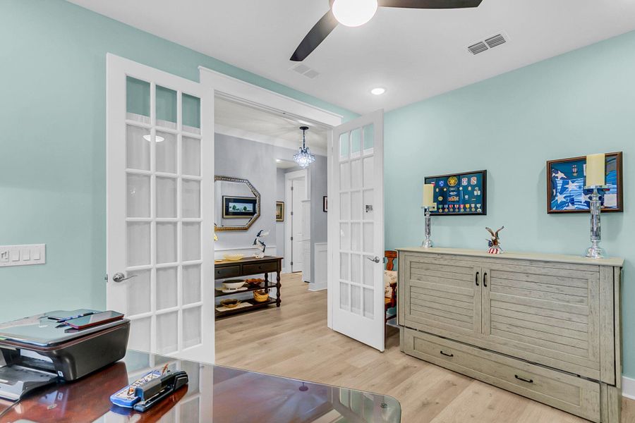Furnished interior view inside a new home in K. Hovnanian's® Four Seasons at Lakes of Cane Bay, Summerville (Image 7).