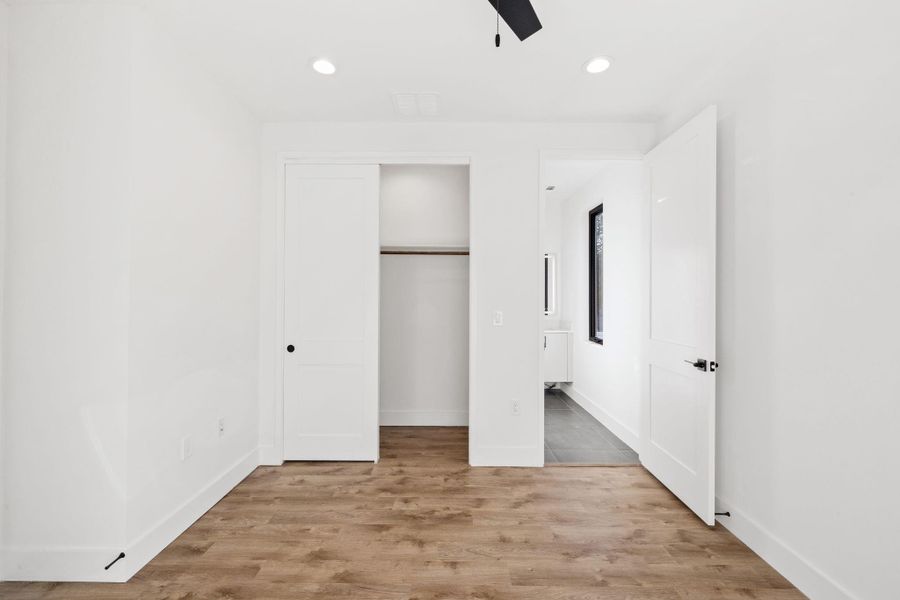 Third bedroom has a ceiling fan and is carpet-free