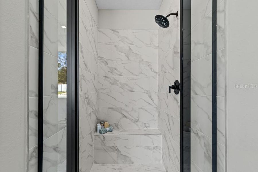 Furnished interior view inside a new home in The Cypress Series at Reserve East, Flagler Beach (Image 29).