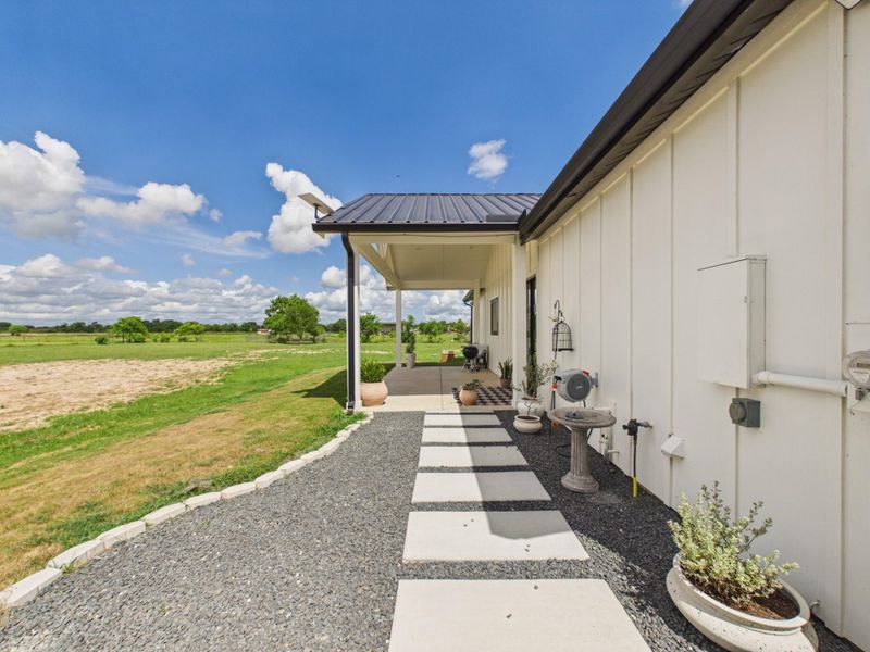 Exterior details and patio area of a home in , Sealy (Image 4).