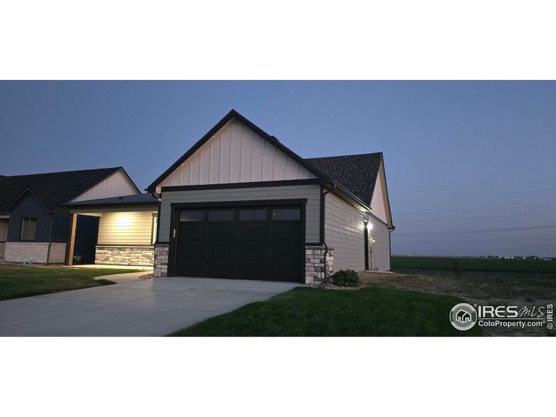 Front exterior of a new home in , Fort Morgan, CO, highlighting curb appeal (Image 21). Front exterior of a new home in , Fort Morgan, CO, highlighting curb appeal (Image 21).