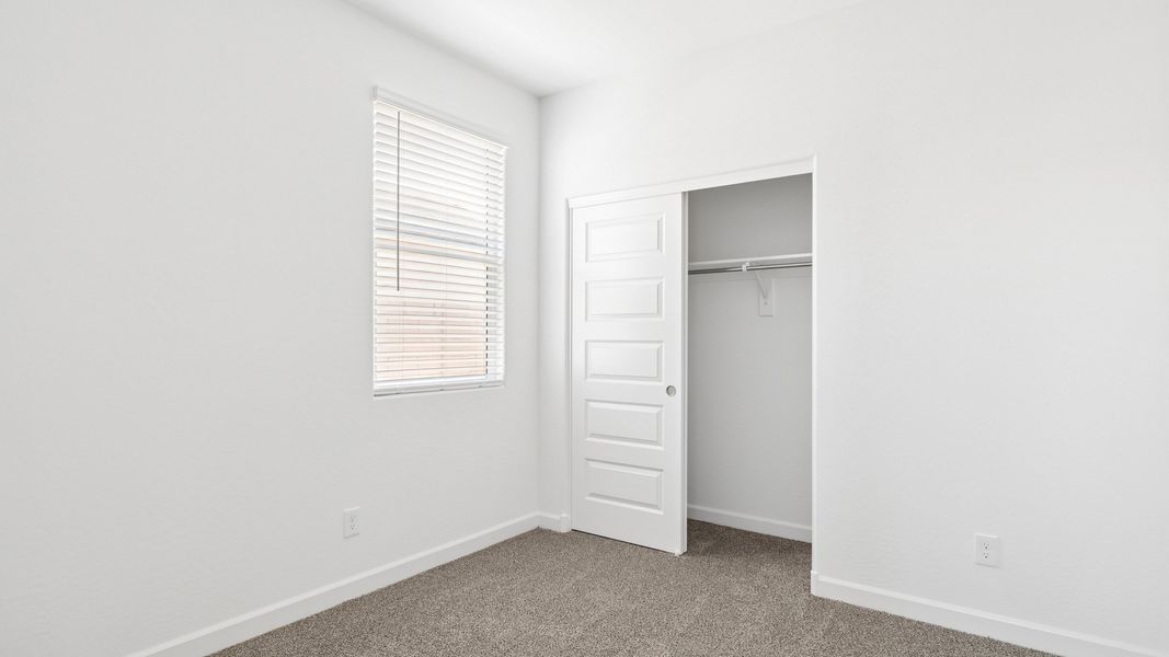 Representative unfurnished interior of a home built from the Raven by D.R. Horton in Magma Ranch Vistas, Florence (Image 16).