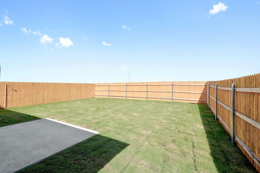 Exterior details and patio area of a home in Trinity Ranch, Elgin (Image 19).
