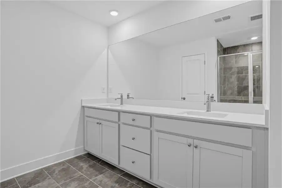 Furnished interior view inside a new home in Towns at Holly Springs, Holly Springs (Image 12).
