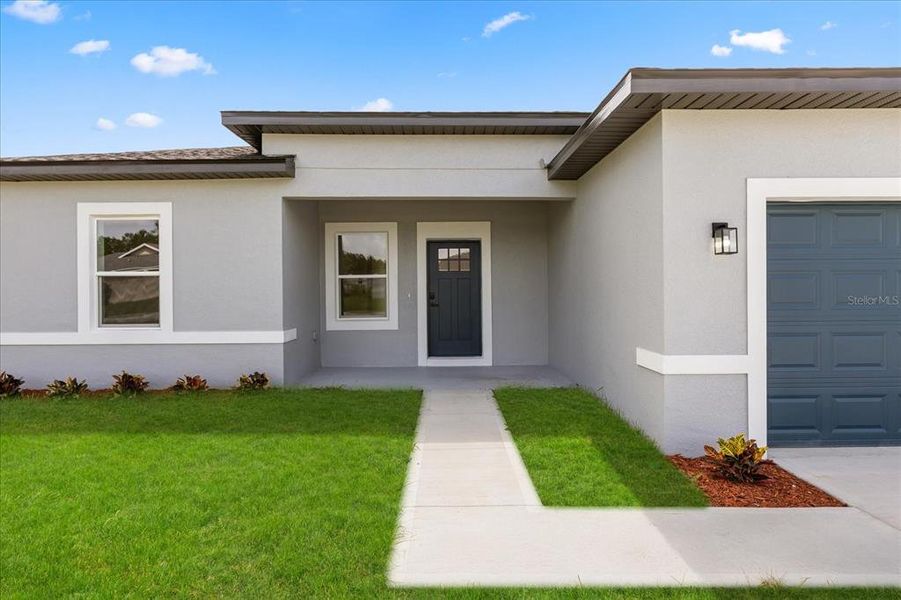 Front exterior of a new home in , Ocala, FL, highlighting curb appeal (Image 24). Front exterior of a new home in , Ocala, FL, highlighting curb appeal (Image 24).