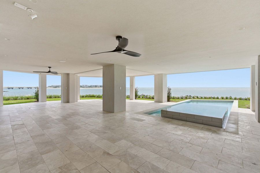 Exterior details and patio area of a home in , Sullivan's Island (Image 36).