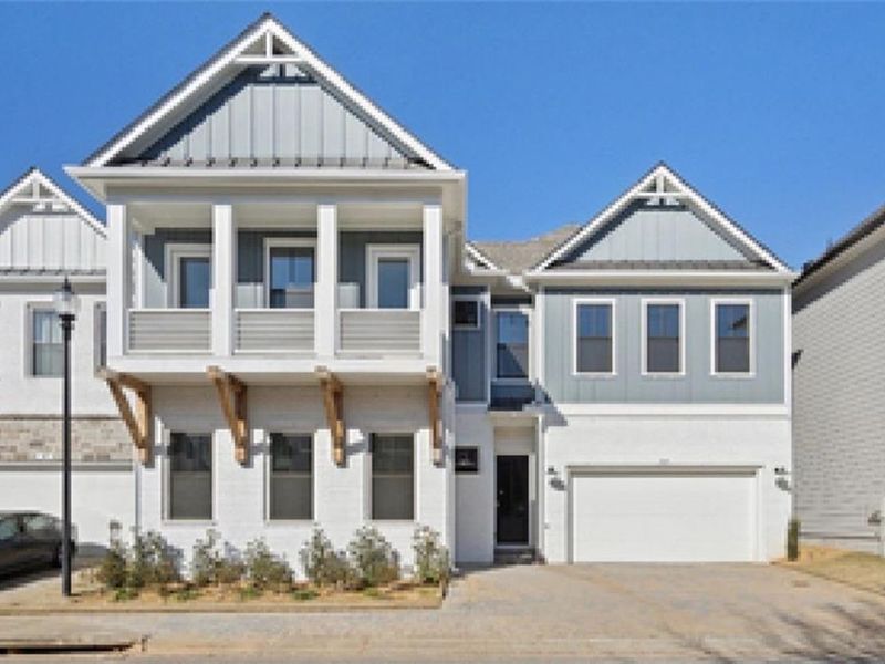 Exterior details and patio area of a home in The Village at Towne Lake, Woodstock (Image 28).
