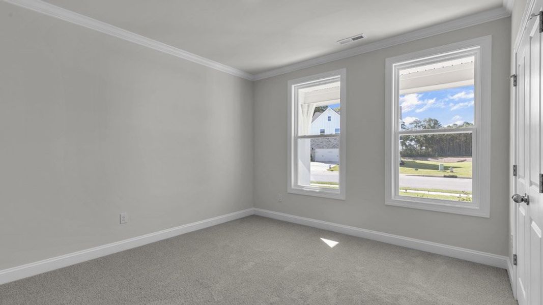 Representative unfurnished interior of a home built from the LAWSON by D.R. Horton in Eagle Creek, Fuquay Varina (Image 9).