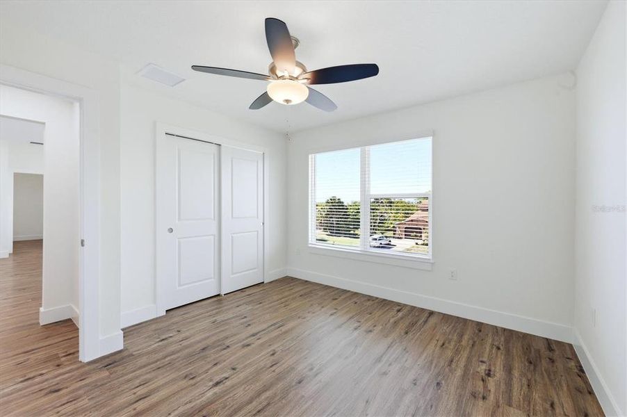 Spacious, unfurnished interior of a new home in , Port Charlotte (Image 26).