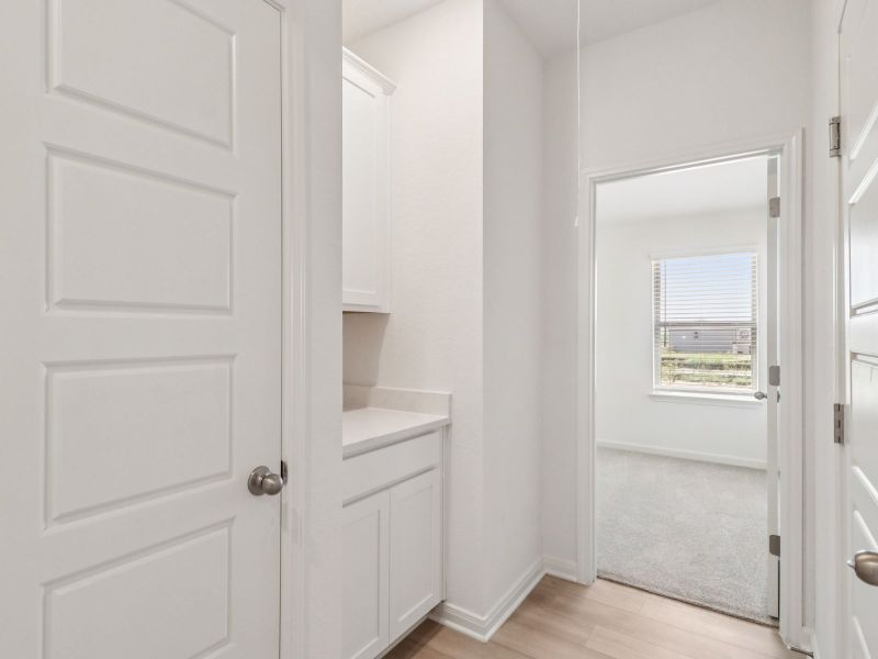 Hallway in the Callaghan floorplan at a Meritage Homes community. Hallway in the Callaghan floorplan at a Meritage Homes community.