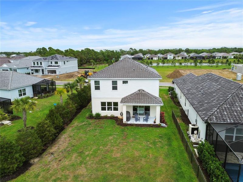 Exterior details and patio area of a home in , Sarasota (Image 29).