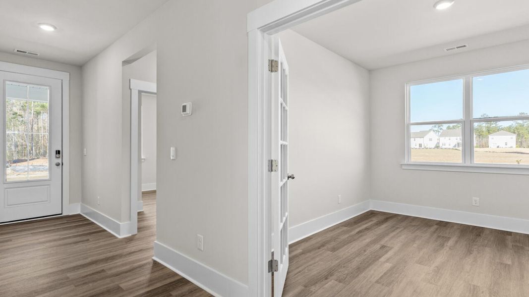 Spacious, unfurnished interior of a new home in Indigo Preserve, Leland (Image 17).