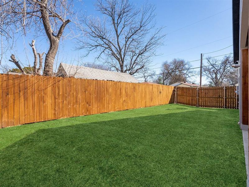 View of yard with a fenced backyard