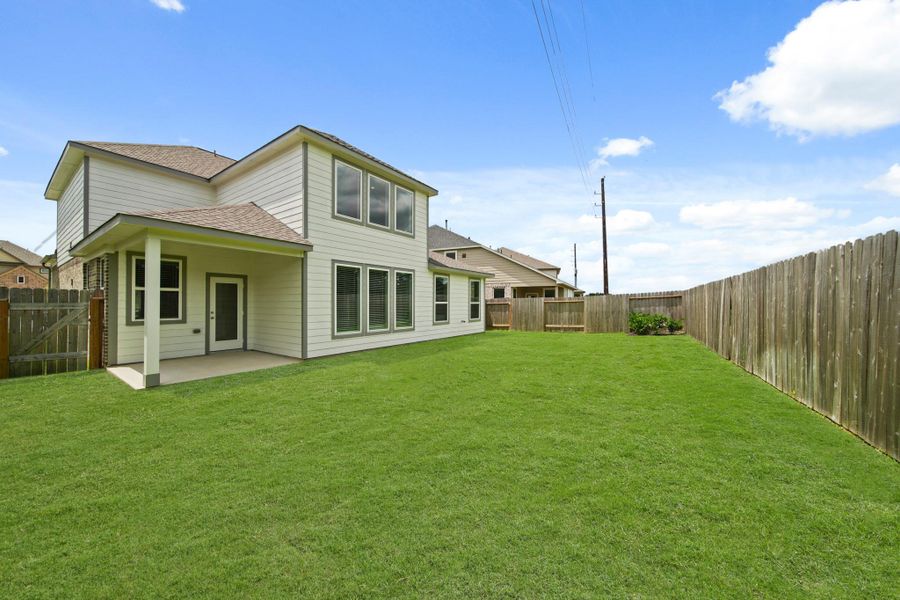 Front exterior of a new home in Grand Oaks – The Cove, Houston, TX, highlighting curb appeal (Image 17).