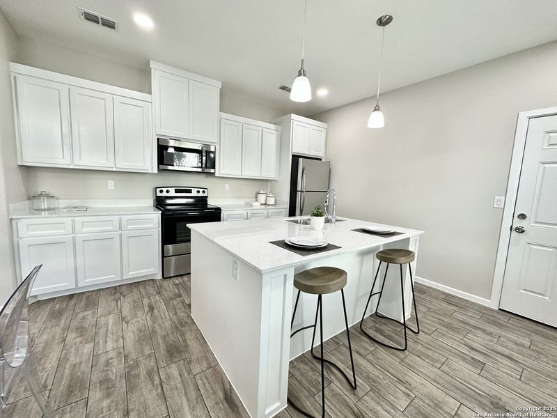 Furnished interior view inside a new home in , Edinburg (Image 8).