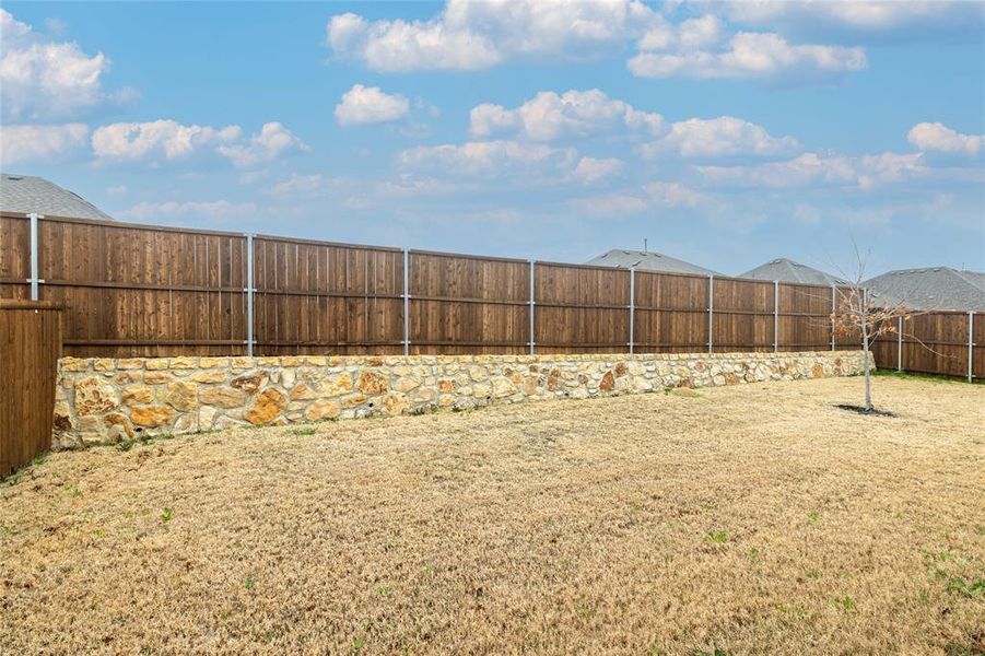 Exterior details and patio area of a home in The Preserve Estates, Northlake (Image 4).