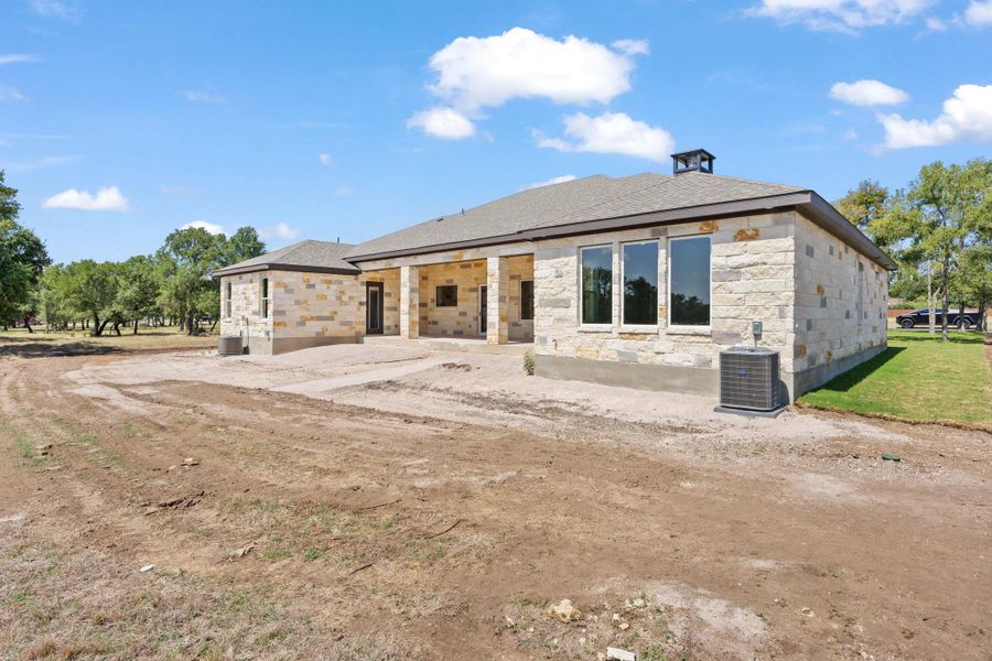 A newly constructed residence features an inviting covered patio, ideal for outdoor enjoyment. A newly constructed residence features an inviting covered patio, ideal for outdoor enjoyment.